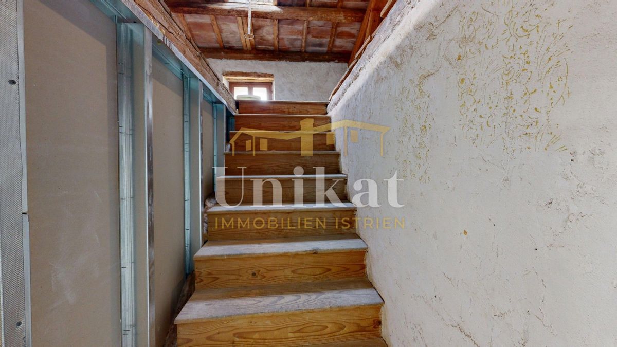 Dvojna hiša z garažo in velikim vrtom